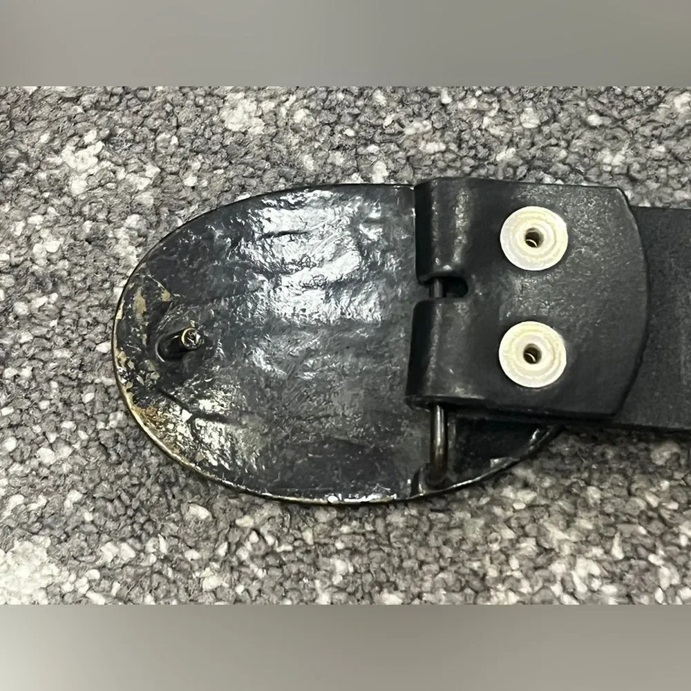 Confederate Civil War-style belt buckle on a Levis’s black leather belt L 38-40